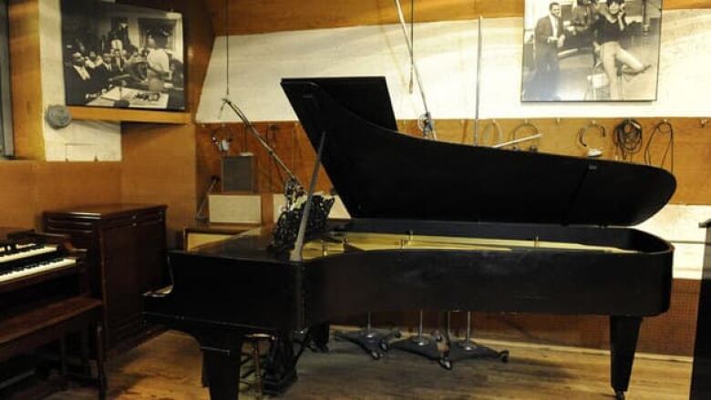 An 1877 Steinway grand piano is displayed at Hitsville USA, the Motown Museum in Detroit. Paul McCartney helped restore the piano, after learning it could no longer be played.