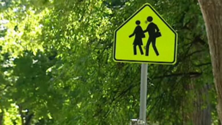 A school zone sign.