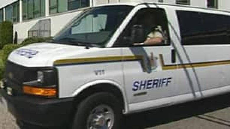 Am image of a white B.C. sherrif's van.