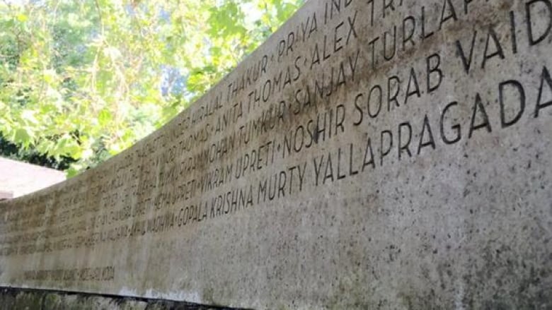 A stone slab with carved names in Vancouver's Stanley Park commemorating the victims of the Air India bombing in 1985.