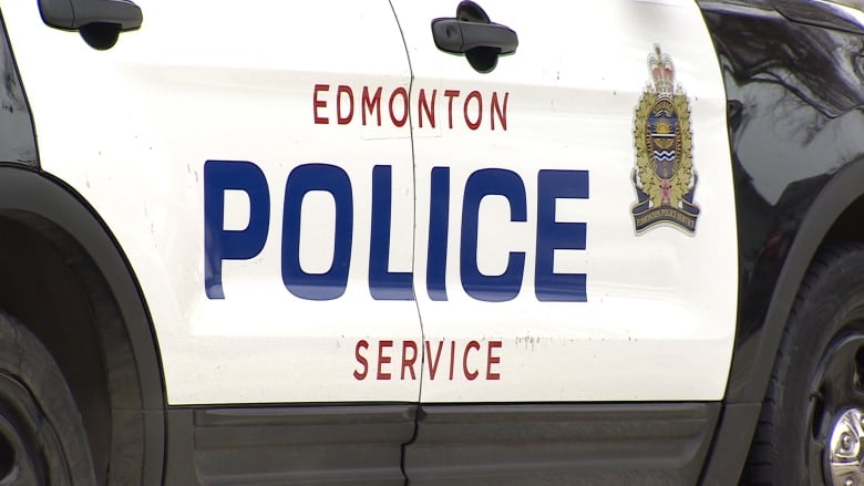 Edmonton police logo on a police car.