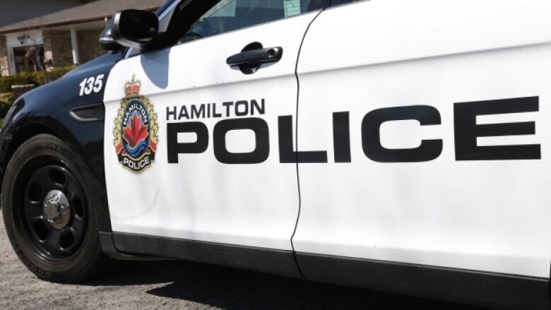 A police vehicle with the words Hamilton police on it. 