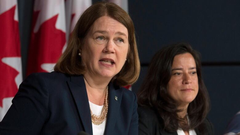 Jane Philpott, seen here with Jody Wilson-Raybould in 2016, resigned from cabinet on March 4. 