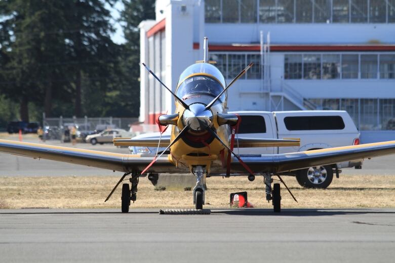 A classic CT-156 Harvard II pictures in the photo in yellow.