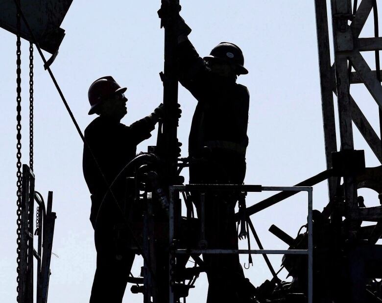 Thousands of people work in the oil and gas sector, including these oil rig workers.