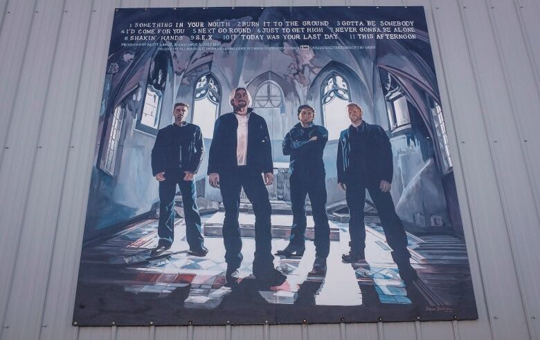 Murals of home town band Nickleback adorn the curling rink in Hanna, Alta.