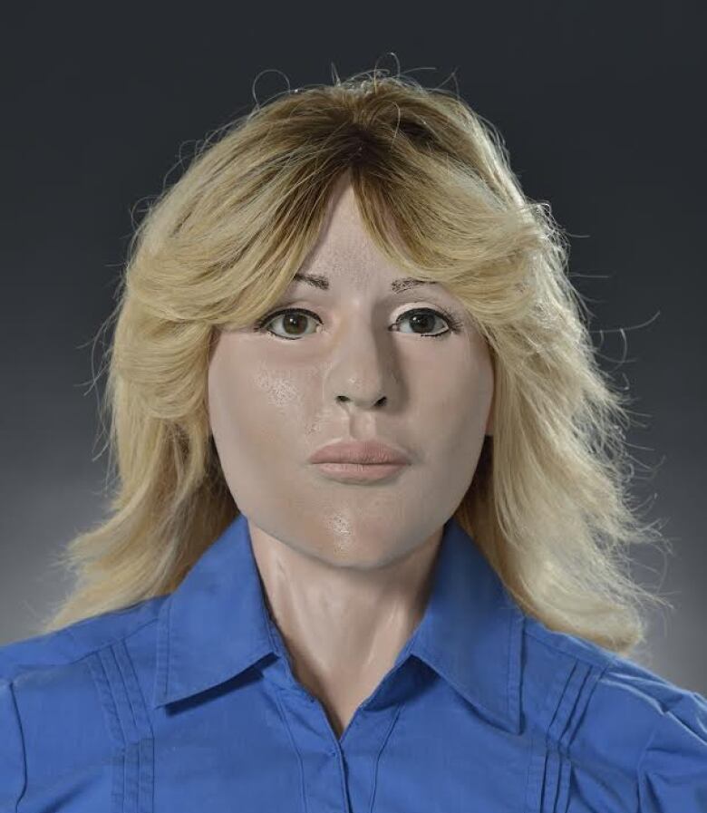 A clay facial reconstruction of a woman.