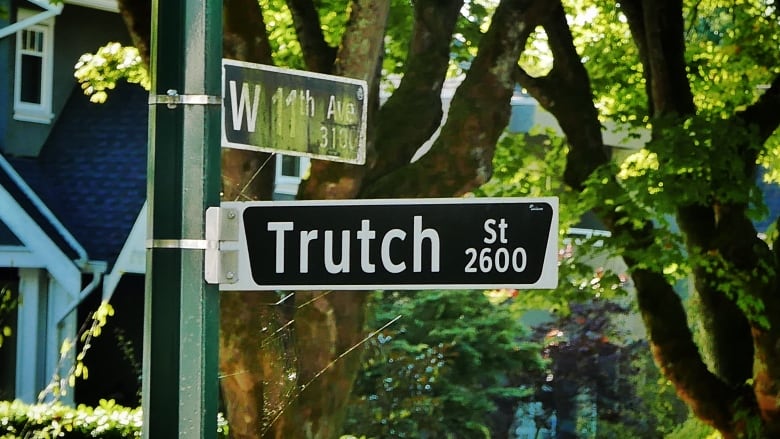 A street sign reading 'Trutch Street'.