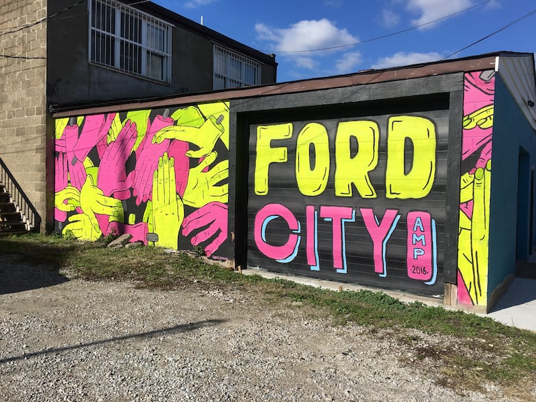 Mural in part of the Alley Mural Project located in a back alley off Drouillard Road 