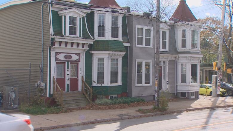 A row of homes on a street corner