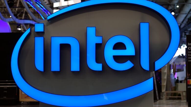 A blue logo for the company Intel is shown on display.