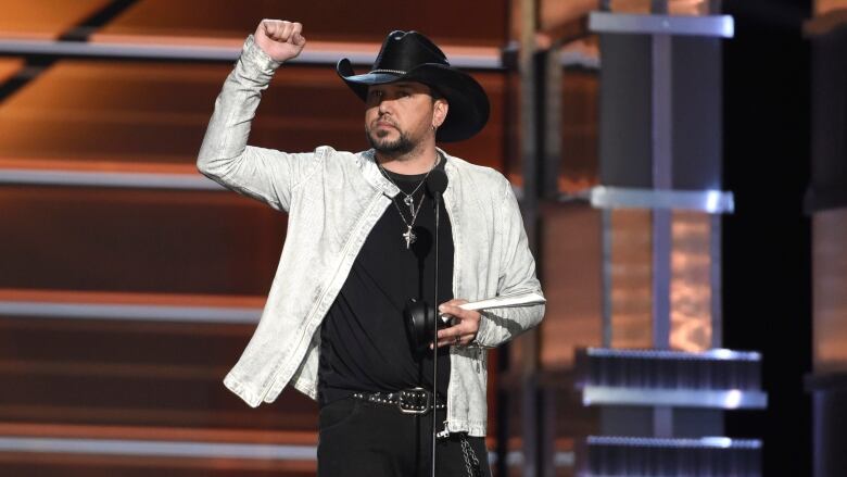 Jason Aldean accepts the award for Entertainer of the Year at the 53rd annual Academy of Country Music Awards at the MGM Grand Garden Arena in Las Vegas on Sunday.  