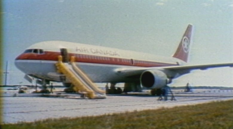 airplane with emergency escape slide deployed