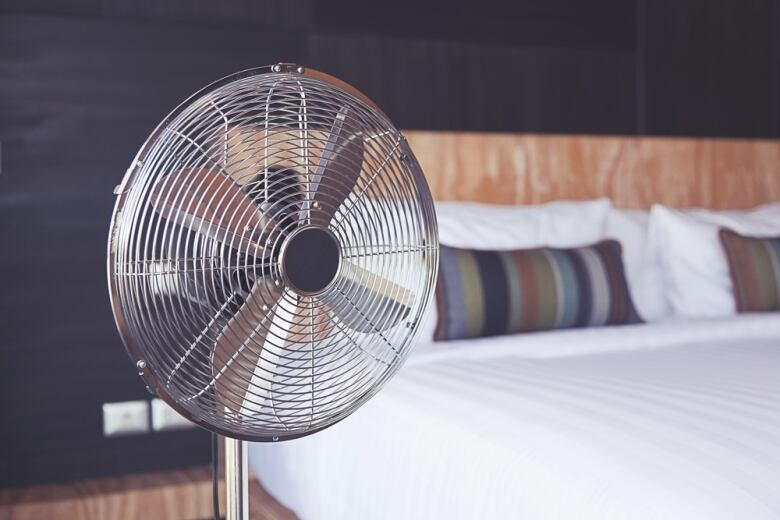 A picture of an oscillating fan. 