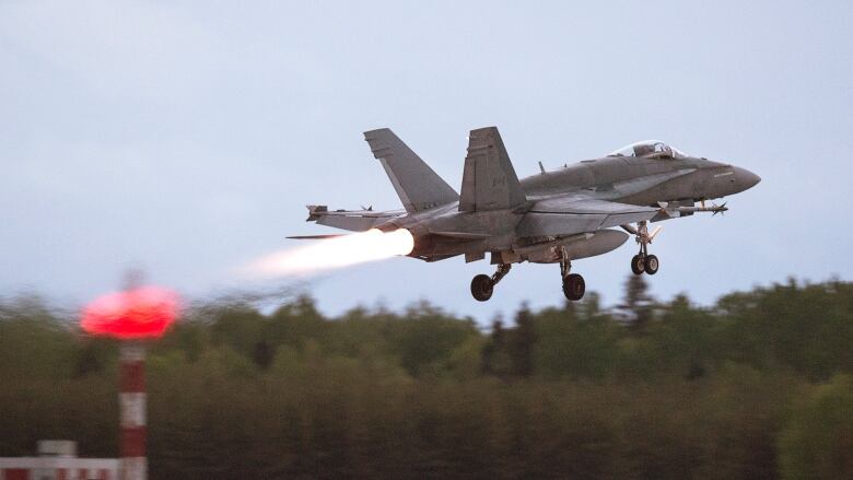 An RCAF CF-18 takes off from CFB Bagotville, Que.