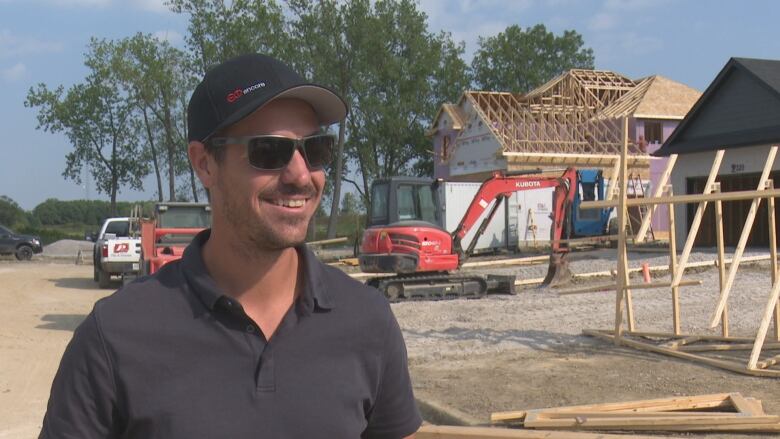 A man stands on a construction site