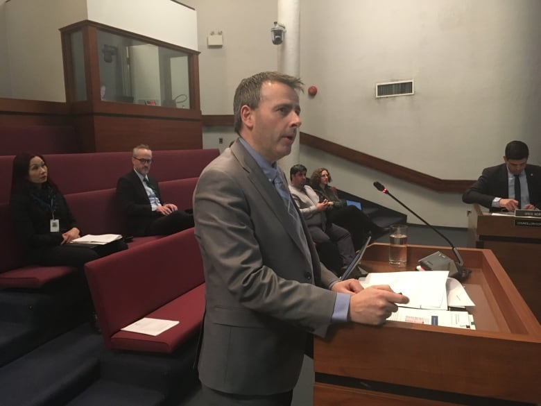 Kevin Fudge stands at the podium at Saint John city council