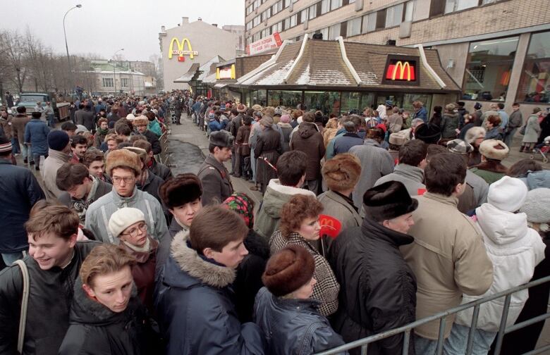 Long queue in front of a Mcdonald's restaurant