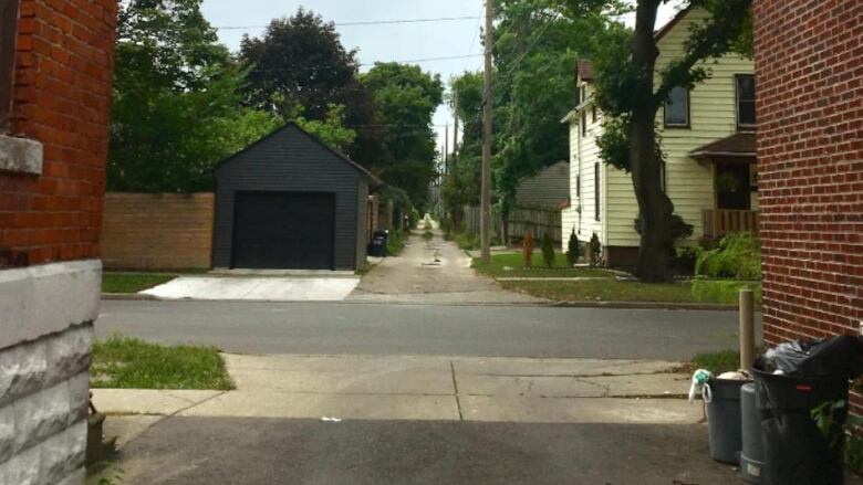 Some Windsor alleys are still used for garbage pickup. 