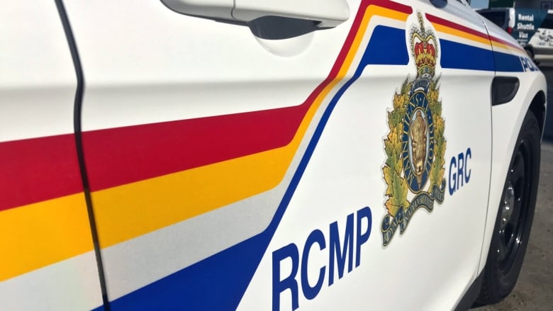 A close-up of the side of an RCMP vehicle.