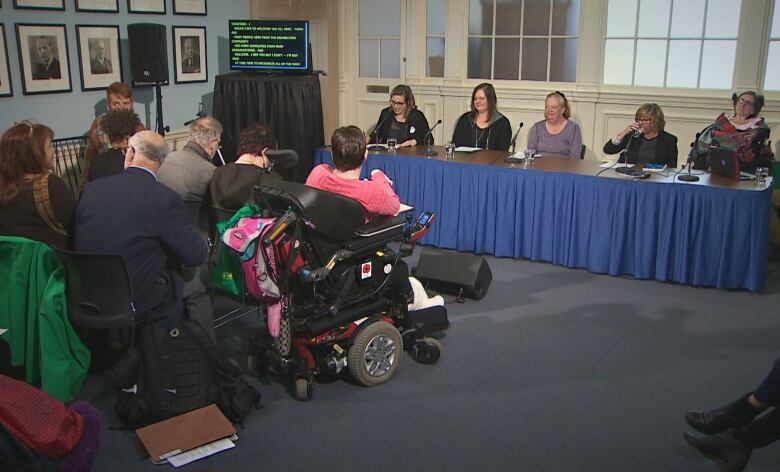 Several disability rights advocates are shown at Province House in Halifax on April 4, 2019.