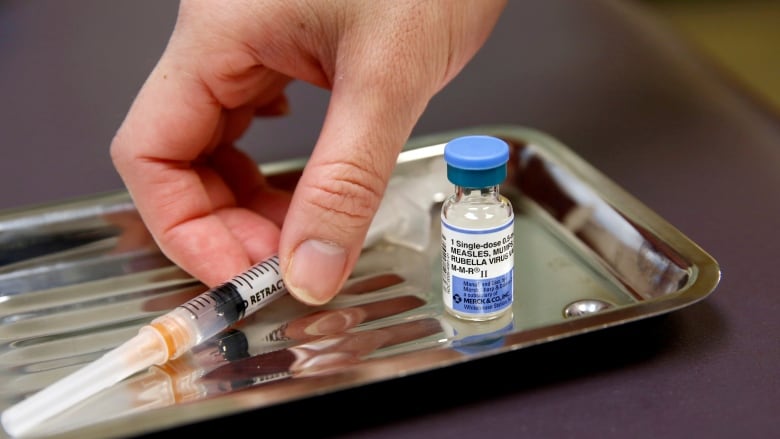 A vial of the measles, mumps, and rubella virus (MMR) vaccine is pictured at the International Community Health Services clinic in Seattle, Washington, U.S., March 20, 2019.  