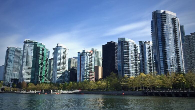 A shot of numerous skyscrapers along False Creek in Vancouver.