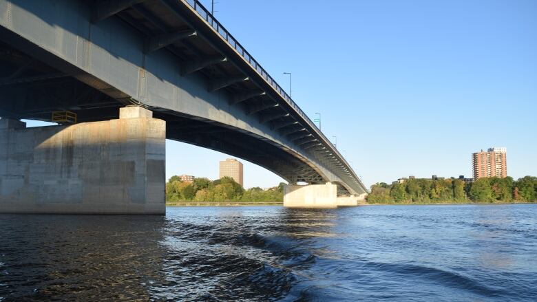 A photo of the underside of the bridge in the day time