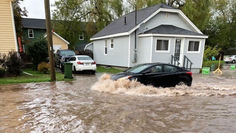 Water on a street in Charlottetown after a thunderstorm