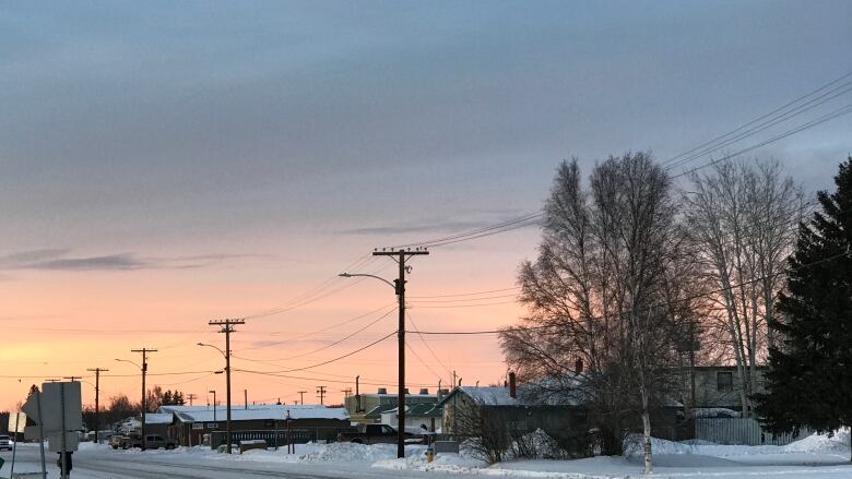 A street in Fort Simpson during a sunset. 