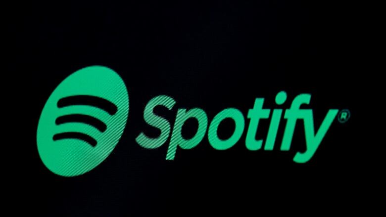 A green logo for music streaming giant Spotify.