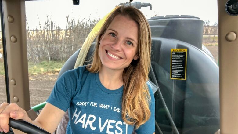 Lesley Kelly inside a tractor.