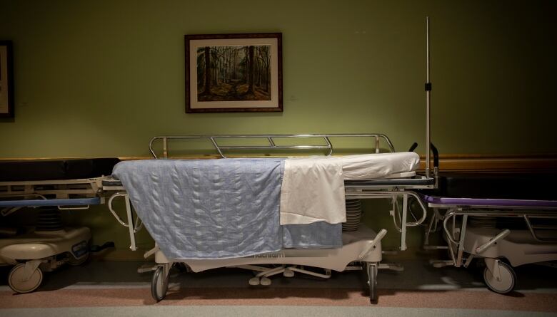 A hospital stretcher in the hallway.