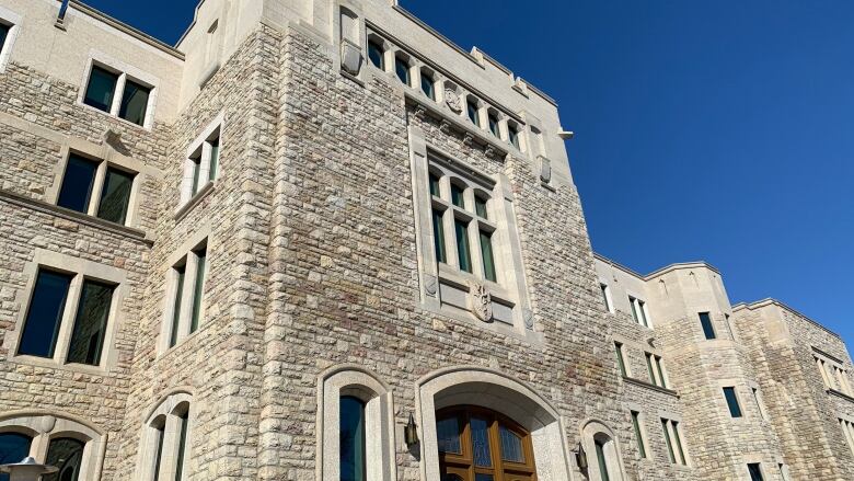 A stone building in the daytime light.