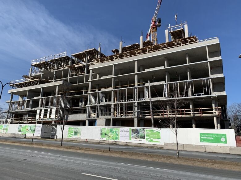 A six-storey construction site made out of concrete forms.