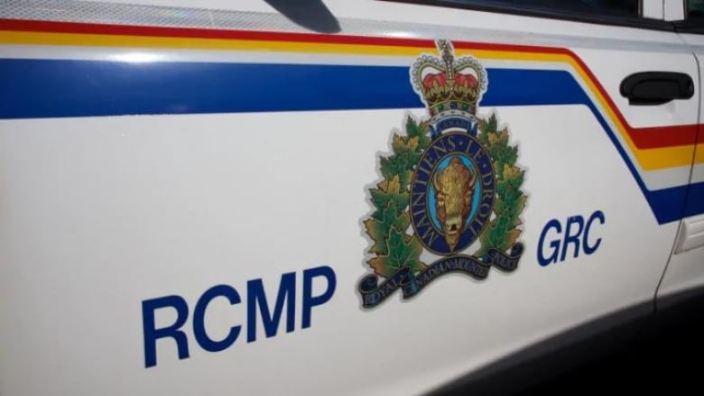 A police car with the RCMP logo and wordmark.