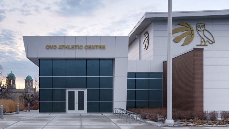 A building with the Raptors and OVO logos and 'OVO ATHLETIC CENTRE' is shown.