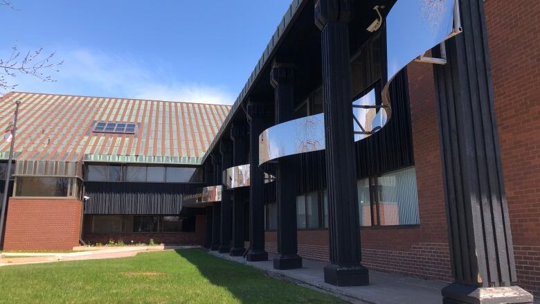 The chrome and brick facade of the P.E.I. Supreme Court building.  