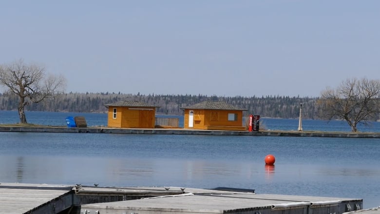 A view of a marina on a lake.