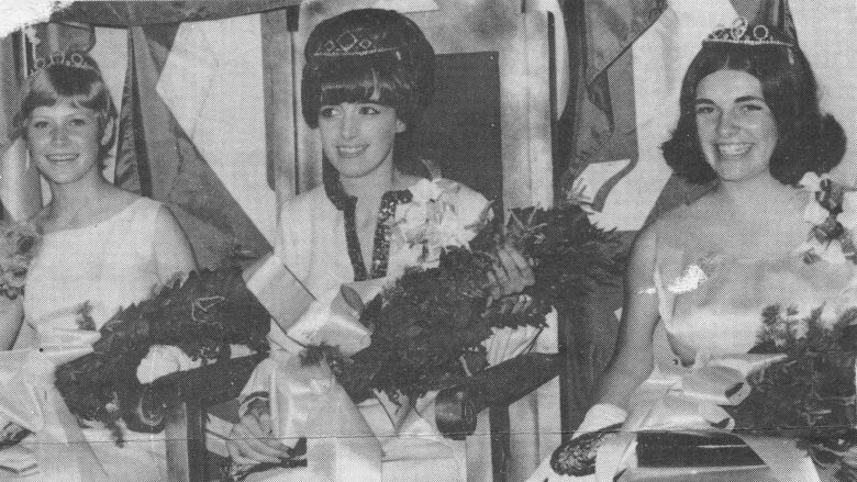 Three women with crowns on their heads in 1970.