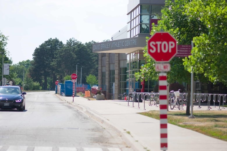 A road with a stop sign.