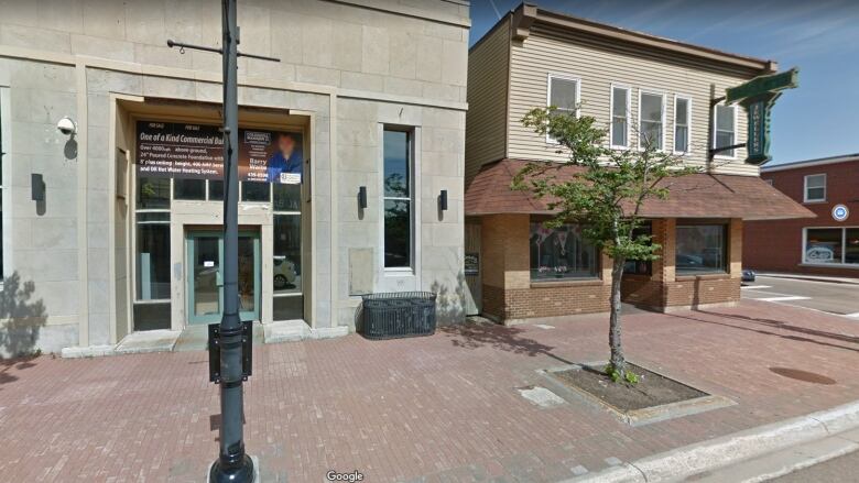 Summerside streetscape with empty sidewalks.