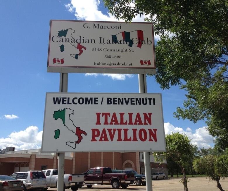 A white sign with the Italian flag sign that says G. Marconi Canadian Italian Club.