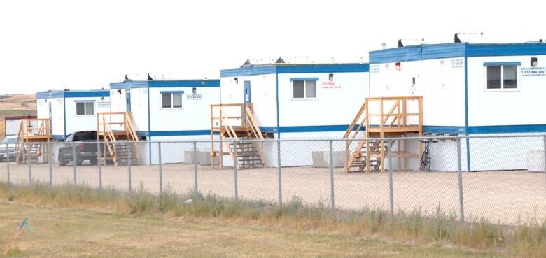 Portable buildings lined up at a work cam in Oyen, Alta.