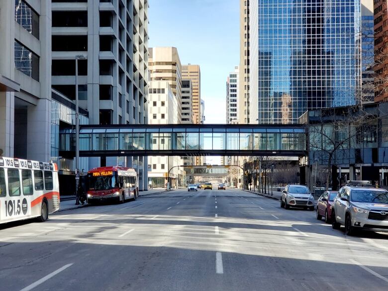 A sky bridge connects two buildings in downtown Calgary. 