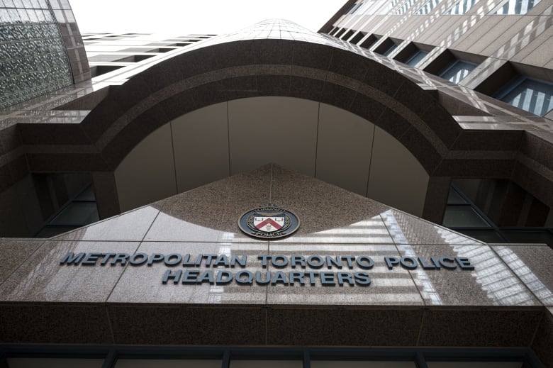 A photo of the Toronto police headquarter sign.