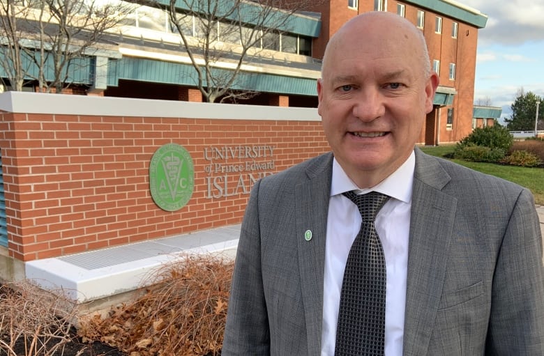 Greg Keefe in front of Atlantic Veterinary College at UPEI.