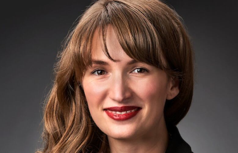 Portrait of woman smiling for camera