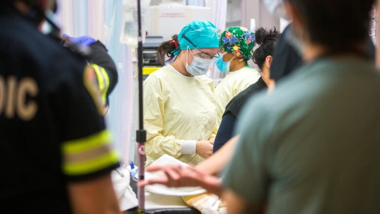 A health care worker in an emergency department is pictured.