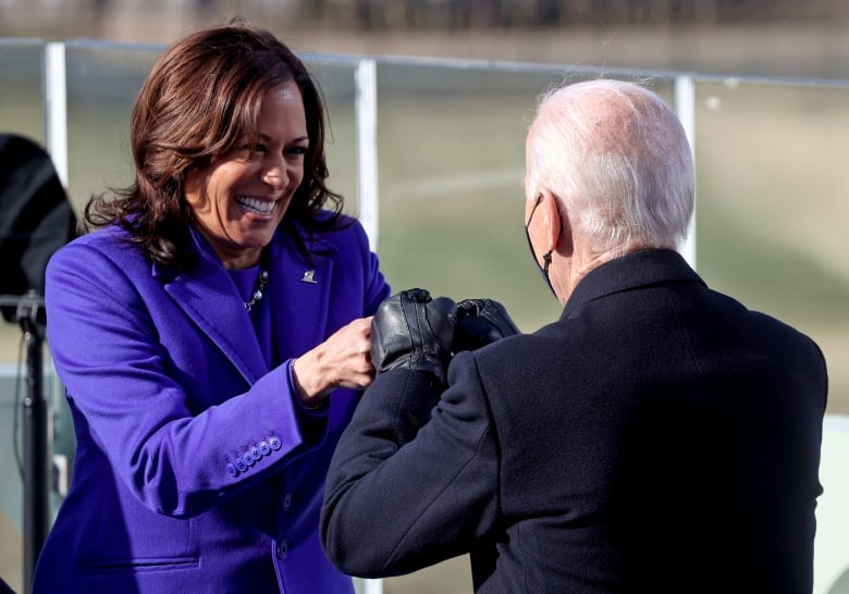 Kamala Harris bumps fists with U.S. President-elect Joe Biden, after she was sworn in as Vice President of the United States.